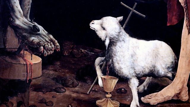 Dettaglio della Crocefissione di Grünewald, agnello immolato ai piedi di Gesù Crocefisso
